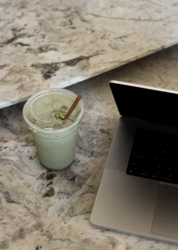 laptop with a drink